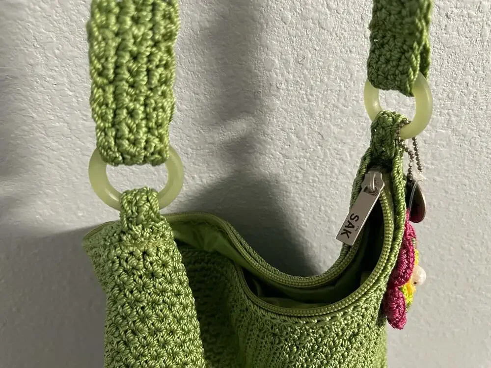 The Sak Green Crochet Shoulder Bag Hobo Purse with Flower Charm